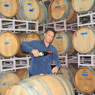 Robert Reyes pouring in the Barrel Room.