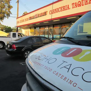 cars parked in front of the store
