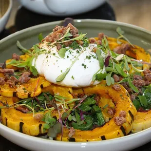 The Burrata was made with delicata squash, spiced local honey, and praline gremolata.