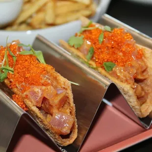 The Ahi Tuna Tacos were made with aji-roja sauce, avocado puree, tobiko, and crispy wontons.