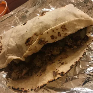 a burrito wrapped in foil