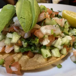 Shrimp ceviche was delicious! The tortilla shell to the freshness of the veggies on top of the boiled shrimp. Try it.