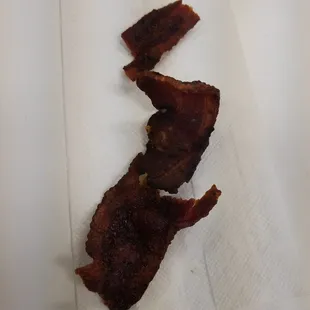 Bacon looks and tasted like it jad been sitting under a heat lamp overnight. Cooks should pay a bit more attention when making the burrito.