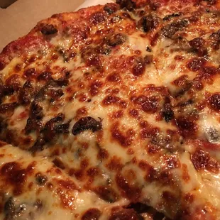 Juicy and flavorful pepperoni and mushroom pizza.