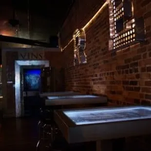 a row of tables in a dimly lit room