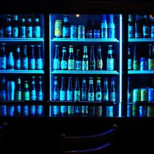 the back of a dimly lit bar