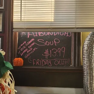 a chalkboard with a message on it