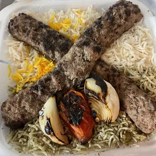 a plate of meat and rice