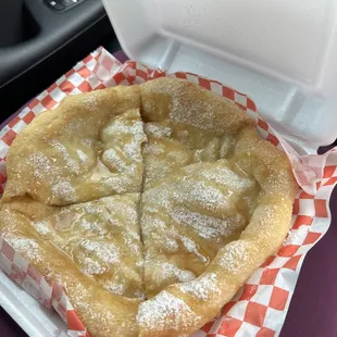 Kept it basic, but was nice. Next time more powdered sugar and maybe I'll ask to fry for a  longer how my momma does it :-)