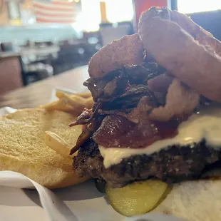 Burger if he month- Swiss, mustard, bacon, onion rings