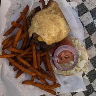 Brunch Burger with bacon and fried egg along with Sweet Potato Fries