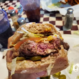 Original RG burger, wheat bun, add jalapenos, medium rare