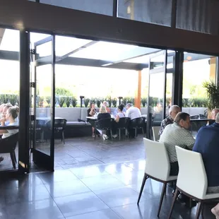 a group of people sitting at a table
