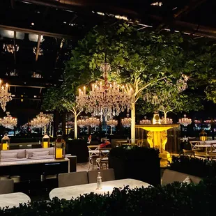 outdoor seating and chandeliers