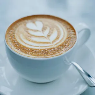 a cappuccino on a saucer