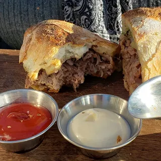 Shaved Ribeye on Charred Garlic Bread*