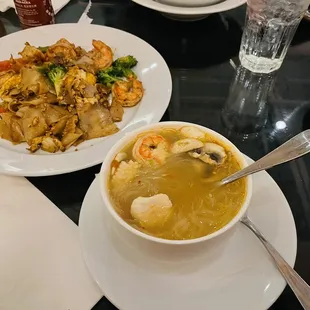 Tum yum soup with added glass noodles level 4 spice level , and drunken noodles