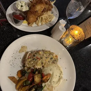Underdone fish, bland chips. waitress never asked how our food was) VERY CHUNKY tartar sauce. Chicken/corn caper gravy raw vegetables.