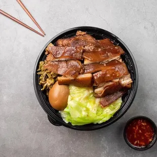 a bowl of asian food