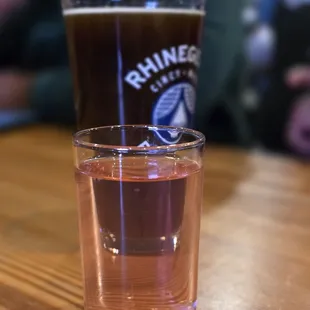 a pint of beer on a table