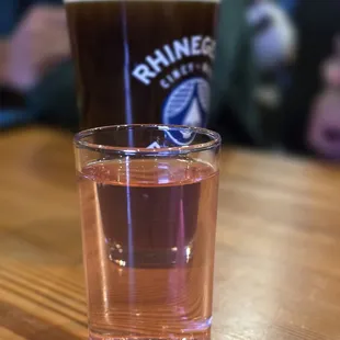 a shot of water and a pint glass