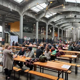 a large group of people sitting at tables