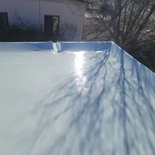 Will keep the house cooler in the summer by reflecting sun rays off the house.