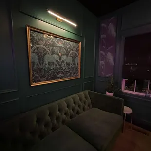 a couch in a dark room