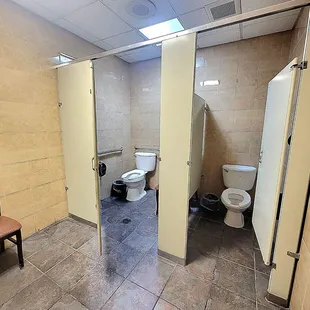 Lady&apos;s restroom stalls are small.
