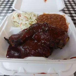 a meal in a styrofoam container