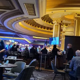 a group of people in a casino