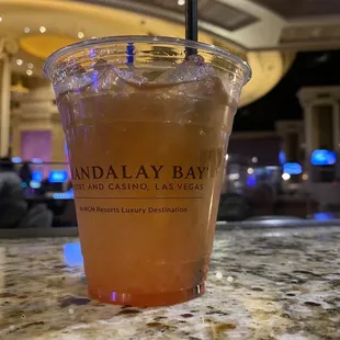 a drink in a plastic cup