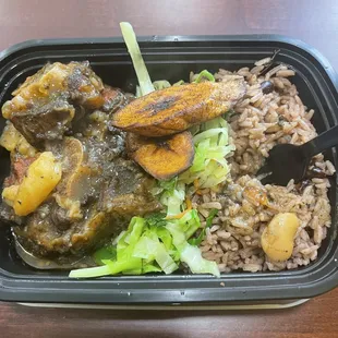 Oxtail, rice and beans, platanos and cabbage