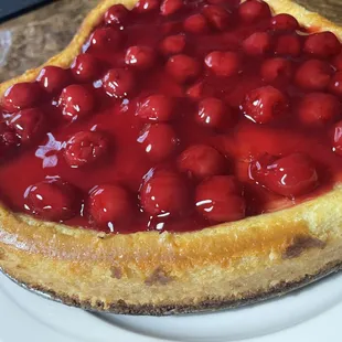 a cherry pie on a plate