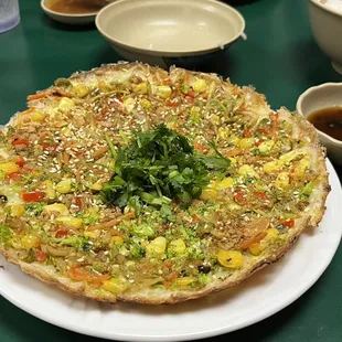 Vietnamese Noodle Pizza and spicy cilantro sauce