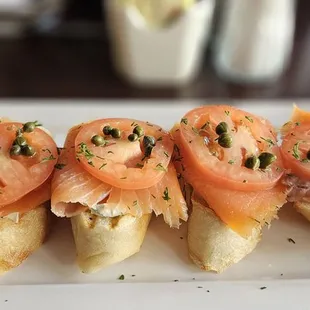 Breakfast Crostini: baguette, dill cream cheese, smoked salmon, tomato, capers, and fresh dill.  Fresh and flavorful!