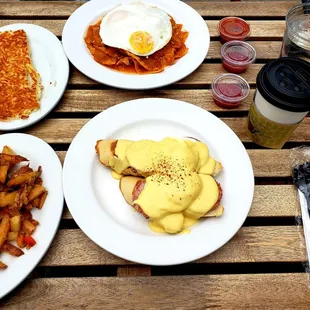 Eggs benedict and Chilaquiles- with hash browns and breakfast potatoes