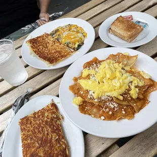 Chilaquiles and hash browns, and omelette with hash browns