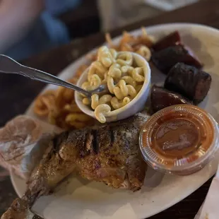 Chicken with sausage. Mac &amp; cheese with fries.