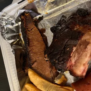 Dry Brisket with the grey fries and tough ribs. Yuck