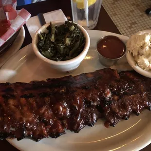 a plate of ribs and sides