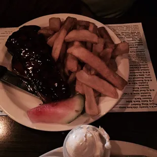 &quot;Cowboy&quot; steak with steak fries.