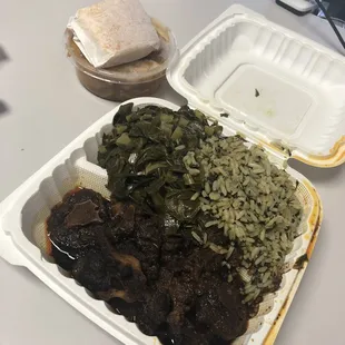 Oxtail with spinach rice and Hot Collard Greens with a side of corn bread and Peach Cobbler