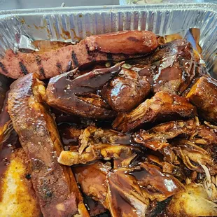 Sampler; sausage,  ribs, rib tips, pulled pork, brisket, and smoked chicken wings.