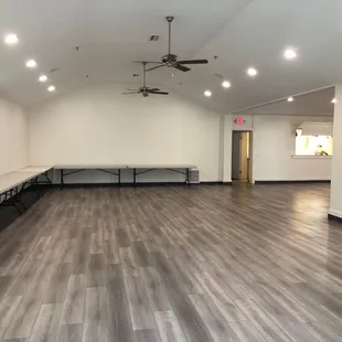 Lots of long tables and circle tables, and all the chairs are new