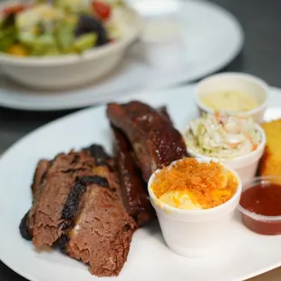 a plate of ribs and sides