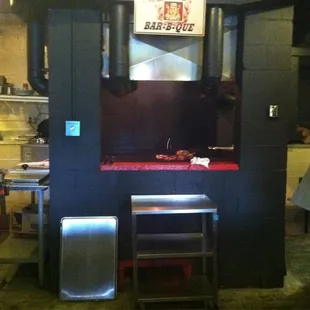 a kitchen with a bbq grill