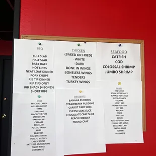 menus on a red wall