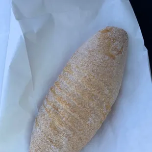 a loaf of bread on a napkin