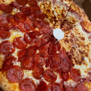 a pepperoni pizza in a box